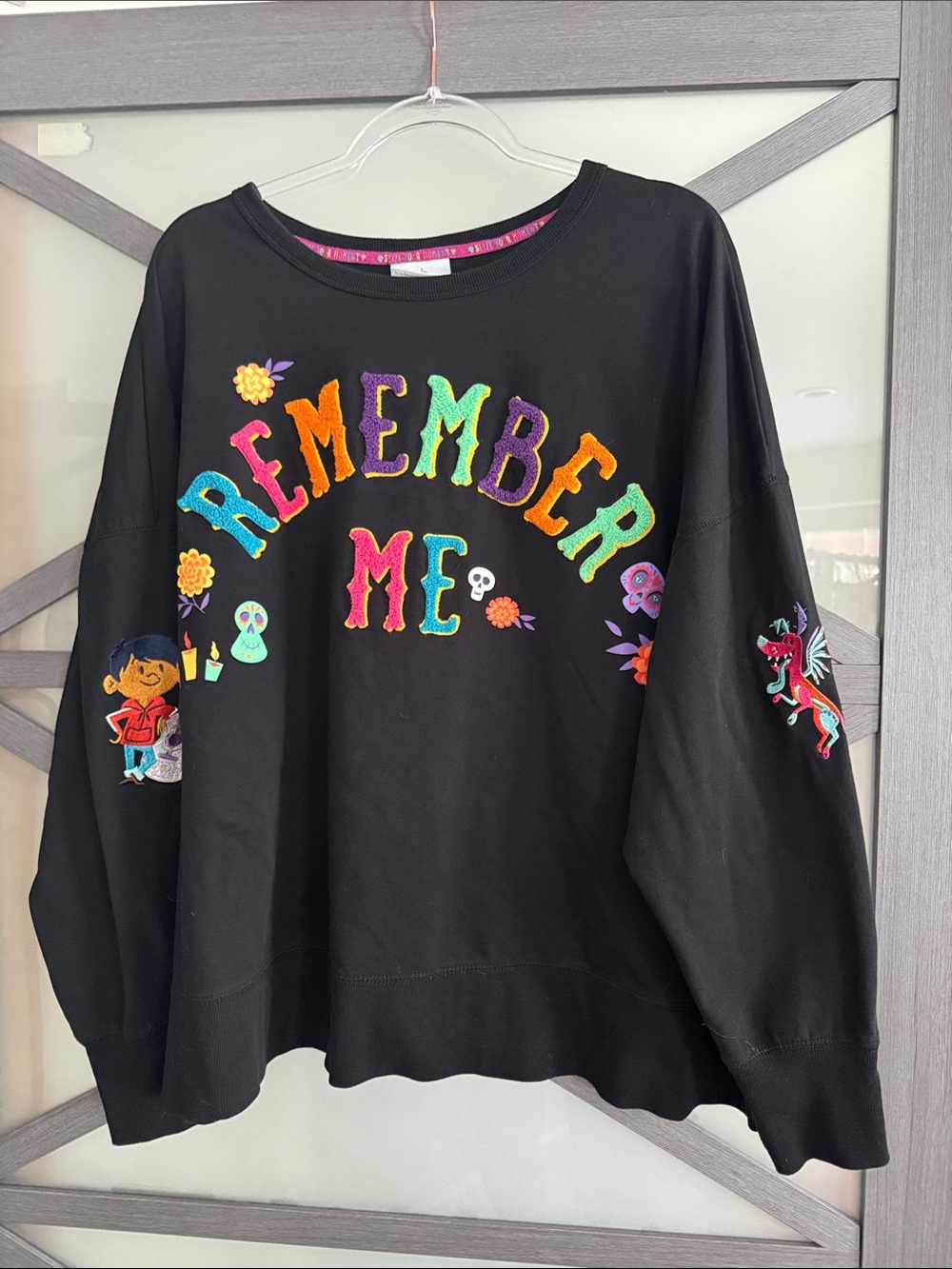 Disney Black Long Sleeve Sweatshirt with Colorful "Remember Me" Embroidery